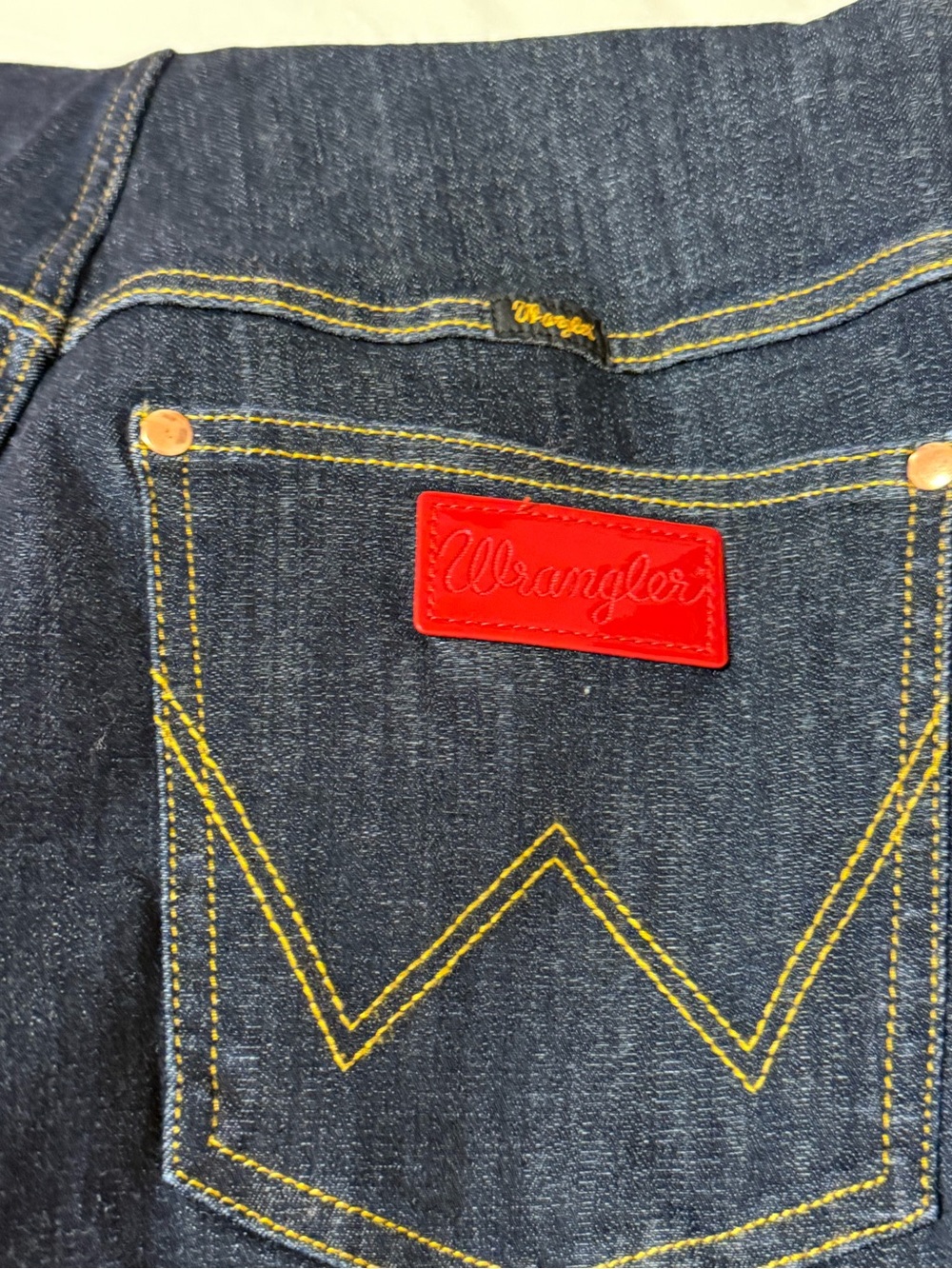 Wrangler women’s Lainey Wilson Dark Blue Flame Denim Jeans with Red Patch 32x32